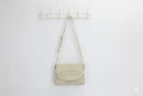 Cream faux leather sling bag-1