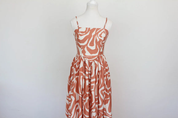 Orange and white patterned corset-style A-line strap maxi dress - M