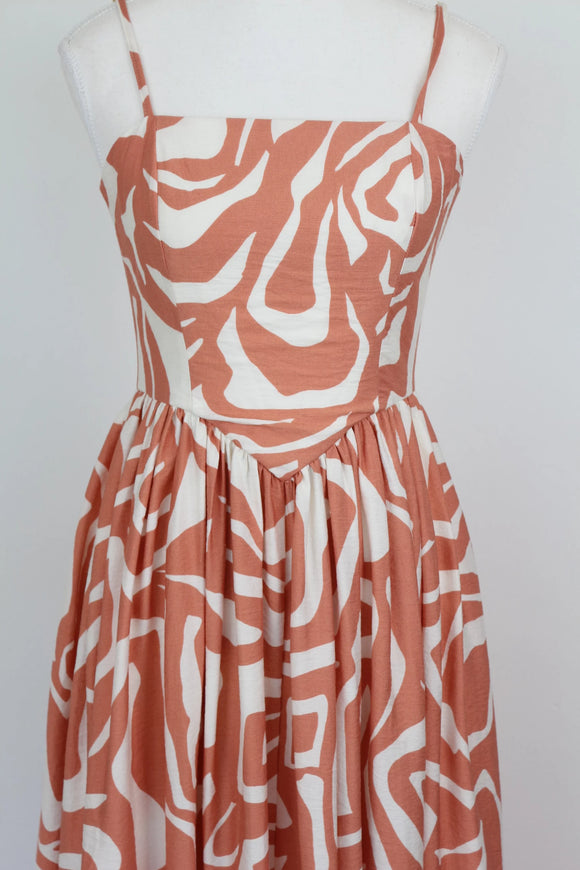 Orange and white patterned corset-style A-line strap maxi dress - M