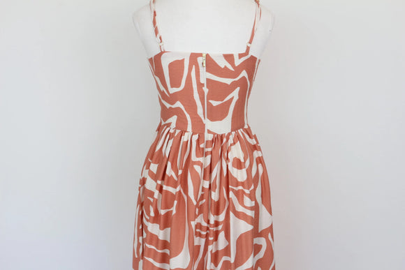 Orange and white patterned corset-style A-line strap maxi dress - M