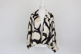 Black and cream patterned long-sleeved blouse - M