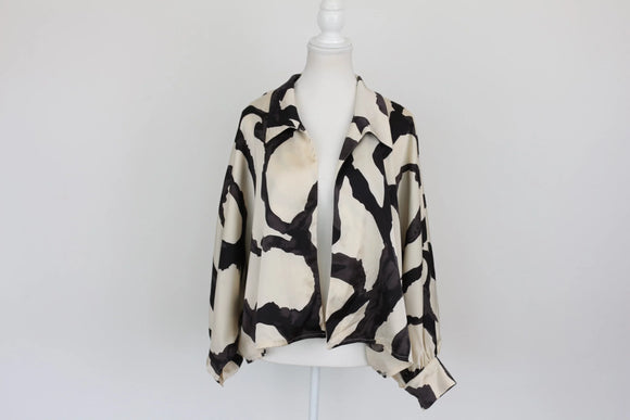 Black and cream patterned long-sleeved blouse - M