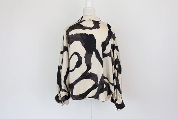 Black and cream patterned long-sleeved blouse - M