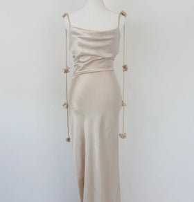 Cream satin dress with flower draping