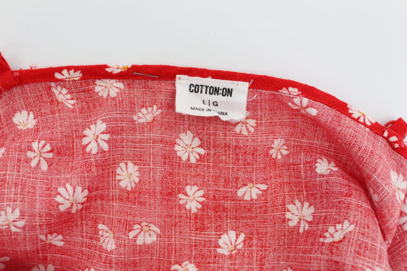 Cotton On red playsuit with daisies - L